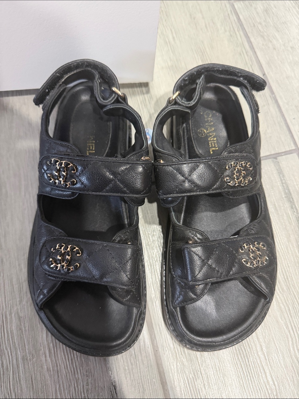 CHANEL Black Quilted women’s Sandals with Gold CC Accents
